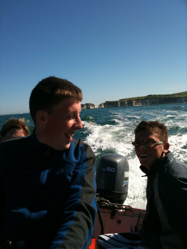 Photograph of people on a boat