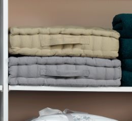 Photograph of towels on a shelf