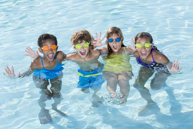 Photograph of children in a swimming pool